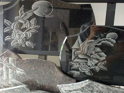 Laser engraving flowers on marble Laser engraving flowers on marble